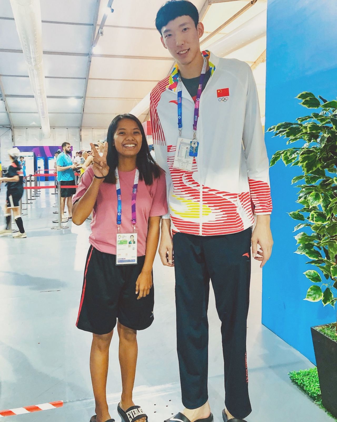 With Zhou Qi — Team China